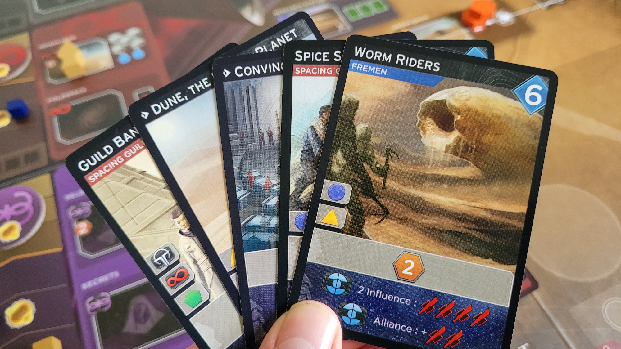 Close up of cards from the Dune Imperium board game