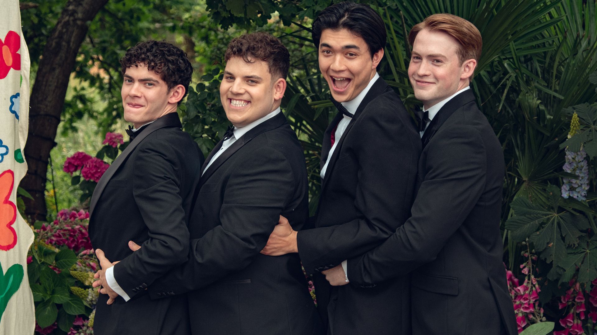 Charlie, Isaac, Tao and Nick all post for a prom photo