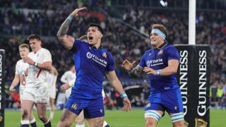 Tommaso Meloncello of Italy national rugby union team celebrates with teammates after scoring a try the fourth match day of the Guinness Six Nations tournament between Italy and England on March 7, 2026 at the Stadium Olimpico in Rome, Italy.
