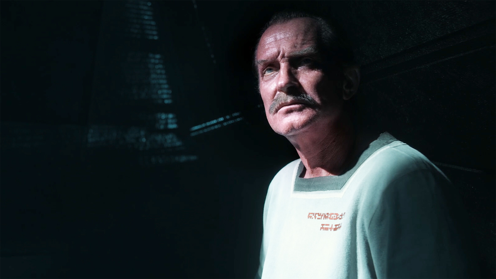 Ulrich Thomsen's Sinestro wearing a white prison jump-suit and sitting down in Lanterns episode 2