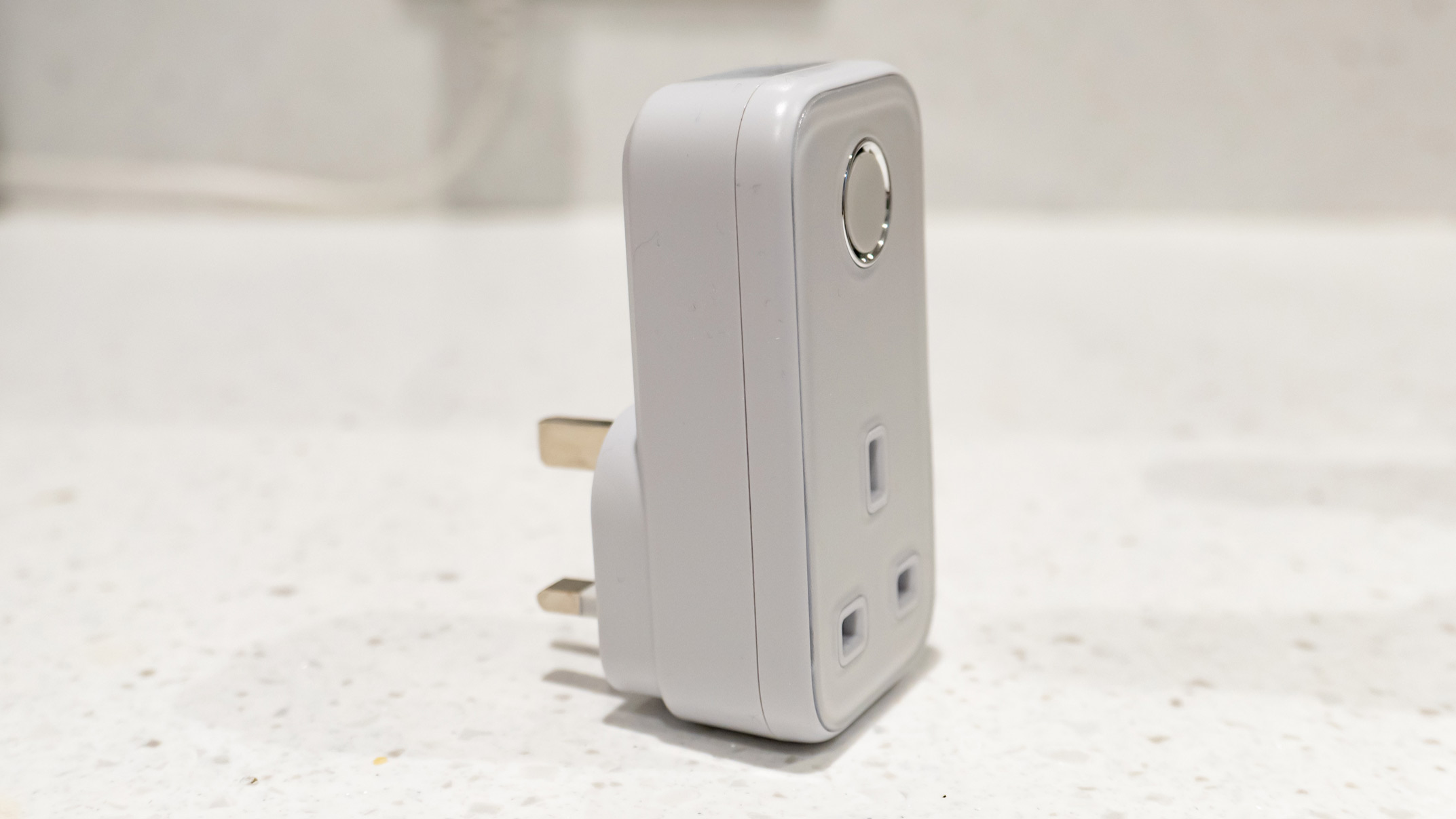 The Hive Active Smart Plug stood upright on a countertop