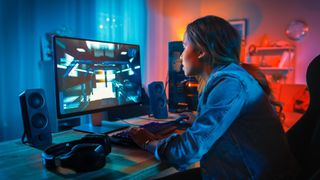 girl playing PC games