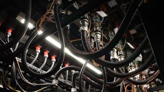 Liquid cooling infrastructure overhead pipes routes into powerful AI servers