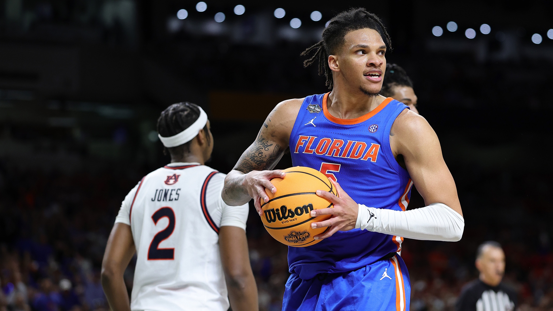 Will Richard  of the Florida Gators celebrating with the ball during the NCAA Men's College Basketball Tournament 2025.