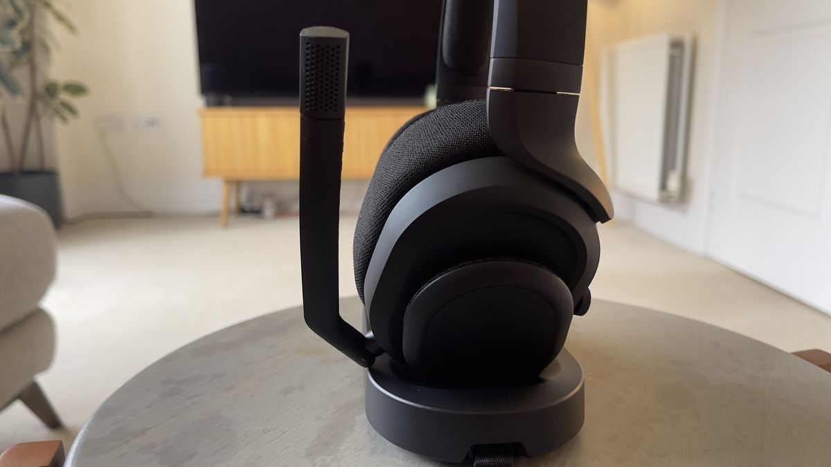 A side shot of the Fractal Scape headphones, showcasing the attached microphone.