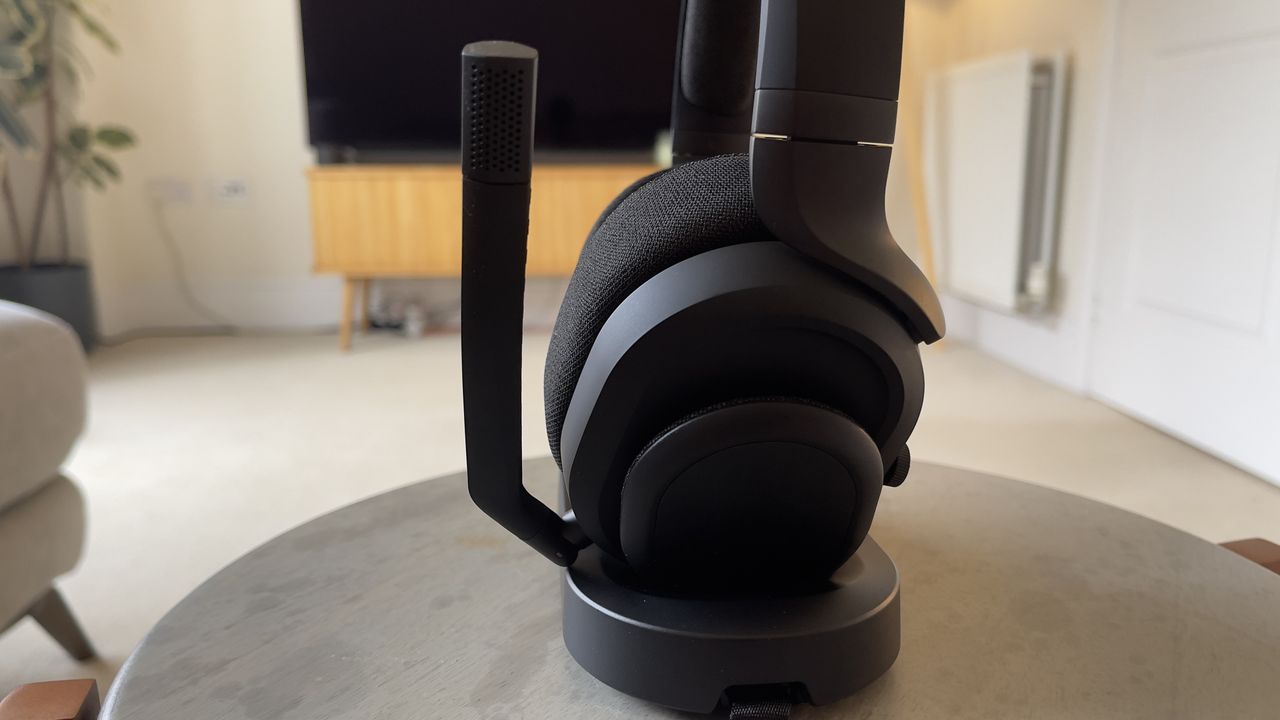 A side shot of the Fractal Scape headphones, showcasing the attached microphone.