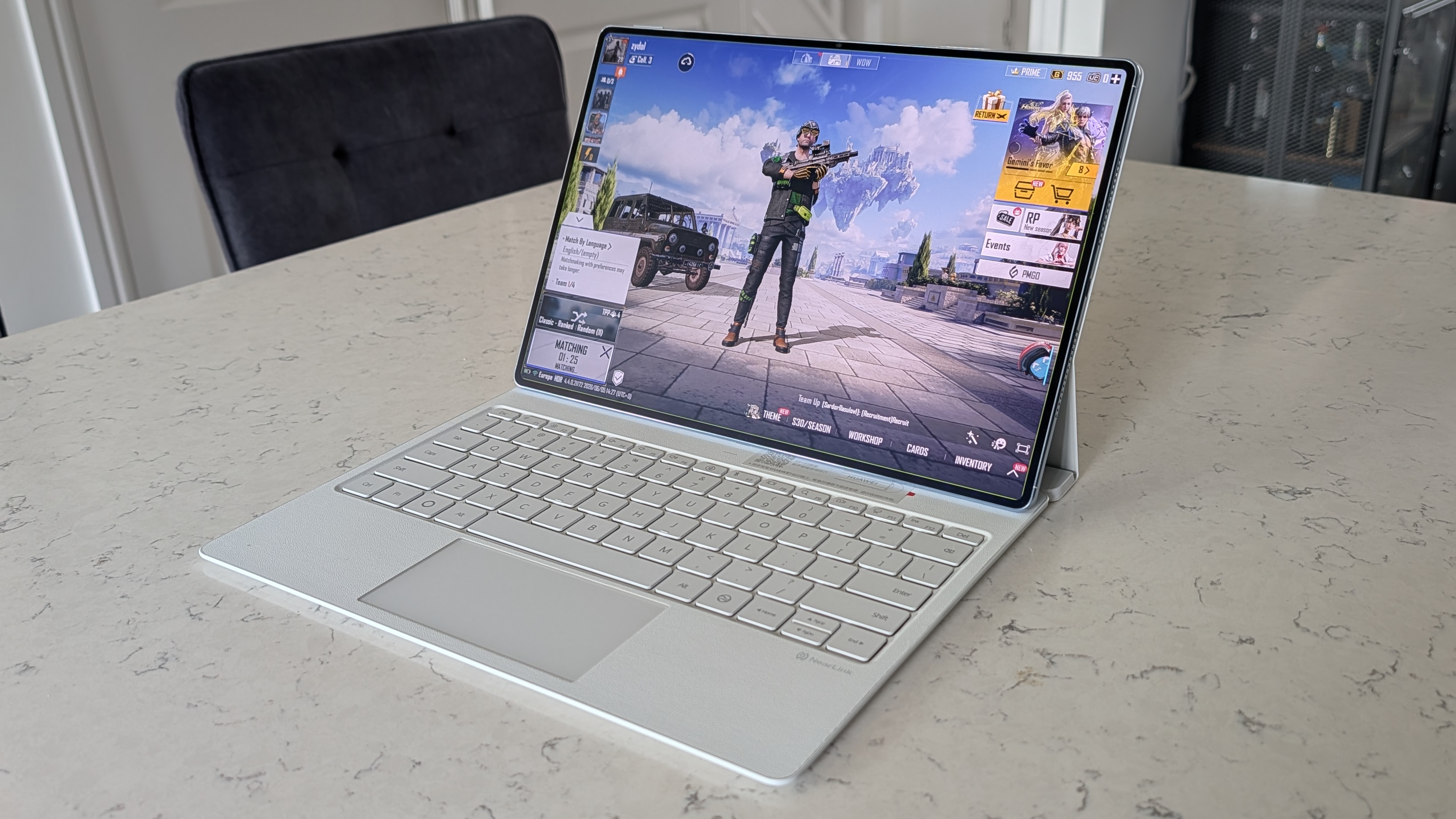 Photos of the Huawei MatePad Pro Max resting on a marble table