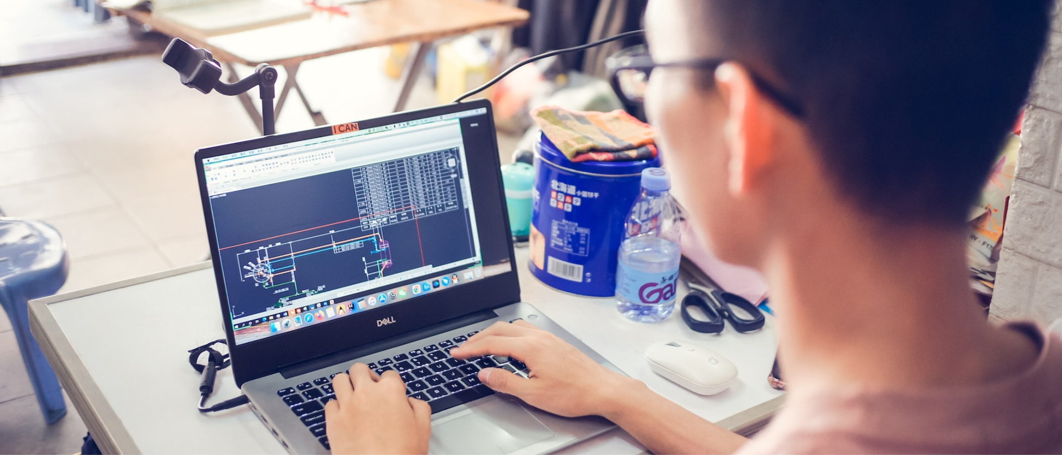Man using laptop for AutoCAD