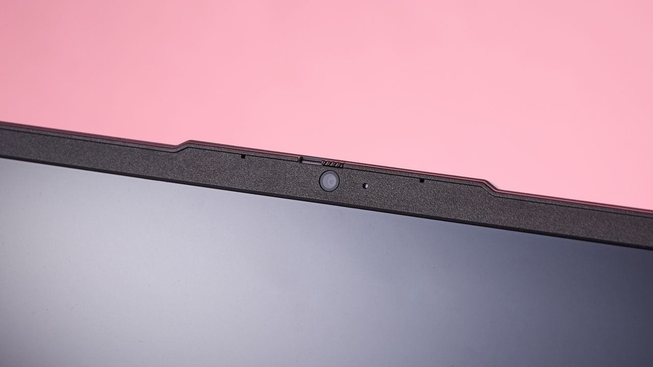 Close-up of webcam on Lenovo LOQ Essential Gen 9, open on desk