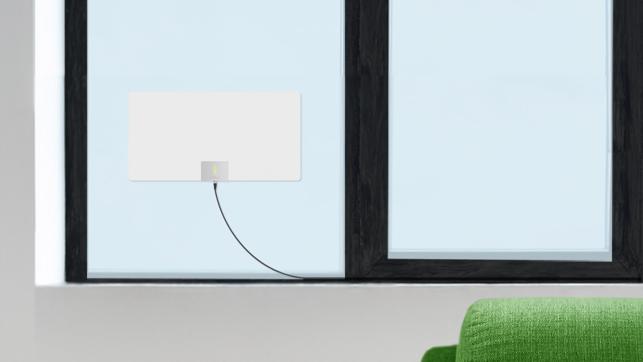 The Mohu Leaf Supreme Pro attached to a window.