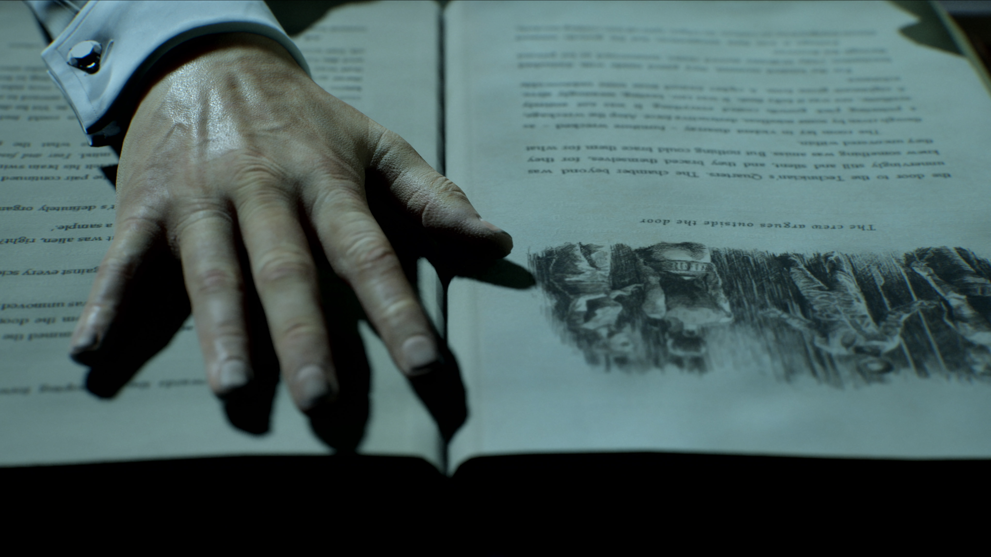 Screenshot from Directive 8020 showing a hand resting over an open book