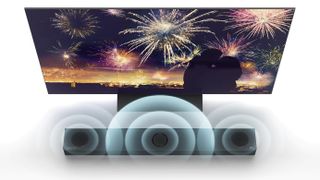 Dolby Atmos soundbar graphic showing sound going up in front of TV