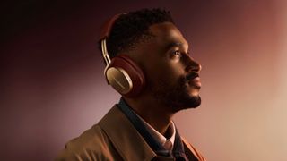 A man wears the new burgundy B&W PX