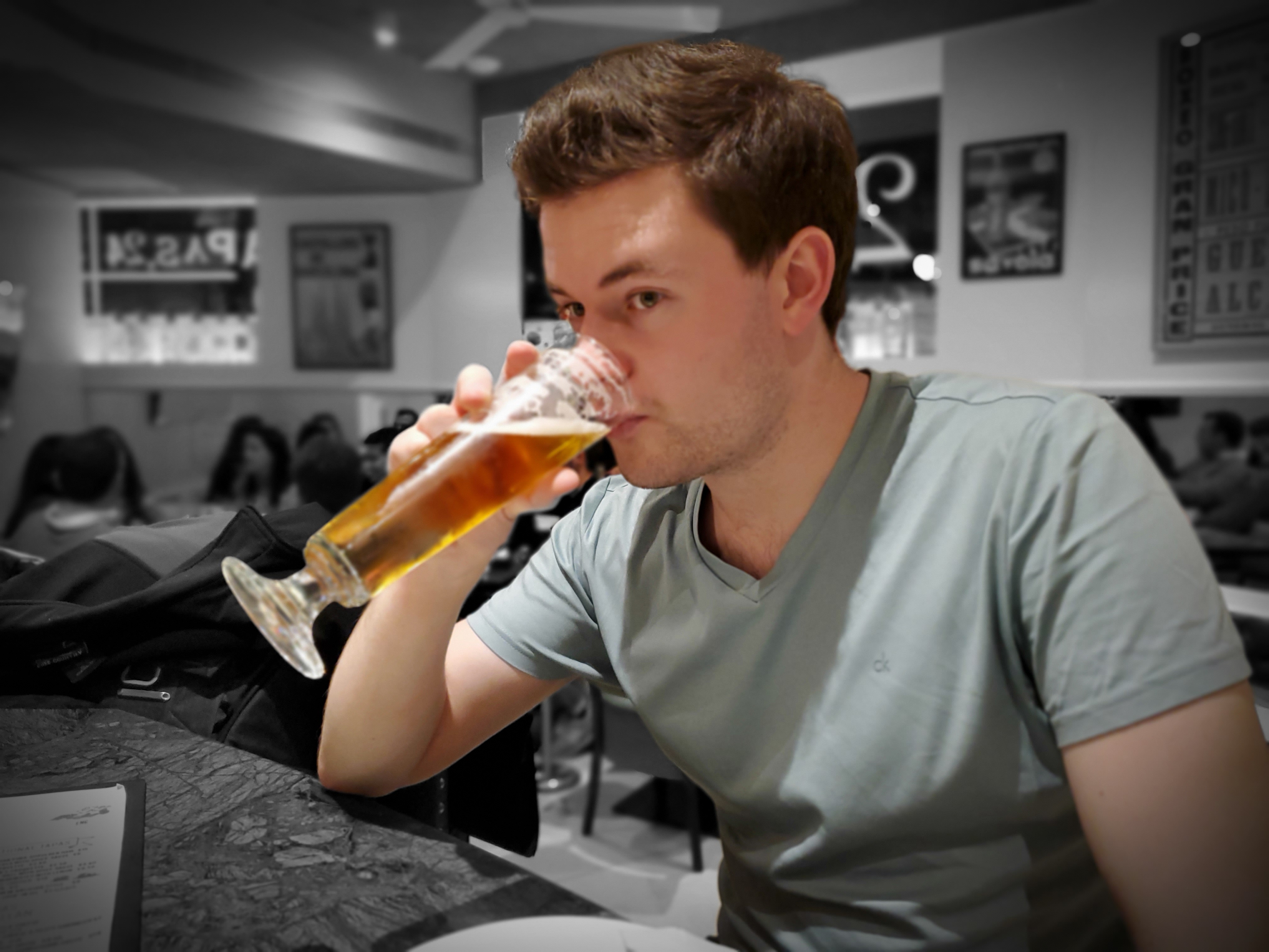 A Samsung Galaxy S10 camera sample of someone drinking a beer