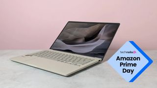 The Asus Zenbook A14 in our strudio during review, with a blue diamond TechRadar badge that reads 'Amazon Prime Day'