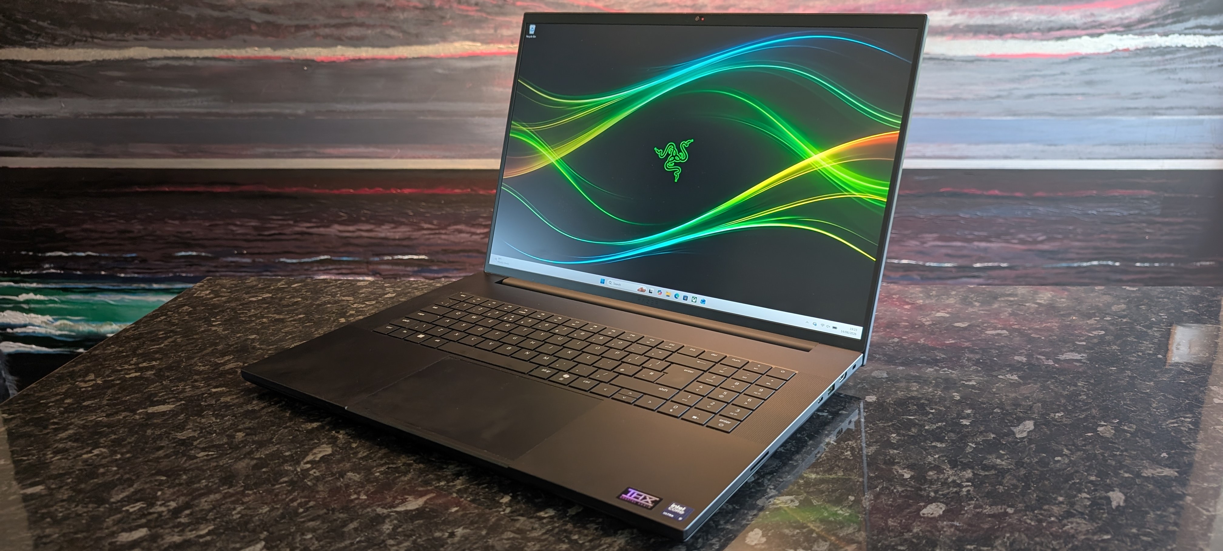 The Razer Blade 18 (2026) pictured on a black marble worktop.