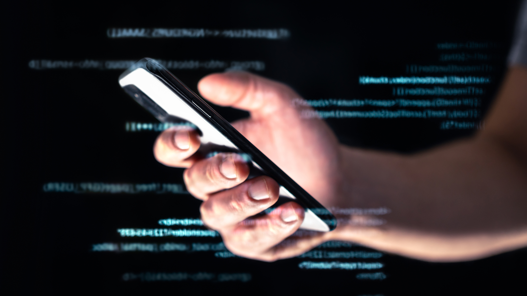 Person holding a mobile phone