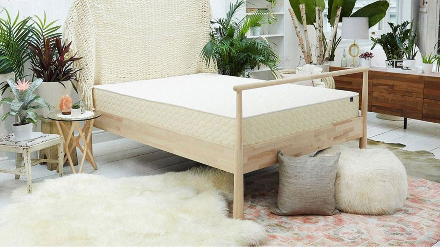 The WinkBeds EcoCloud Hybrid mattress on a bed