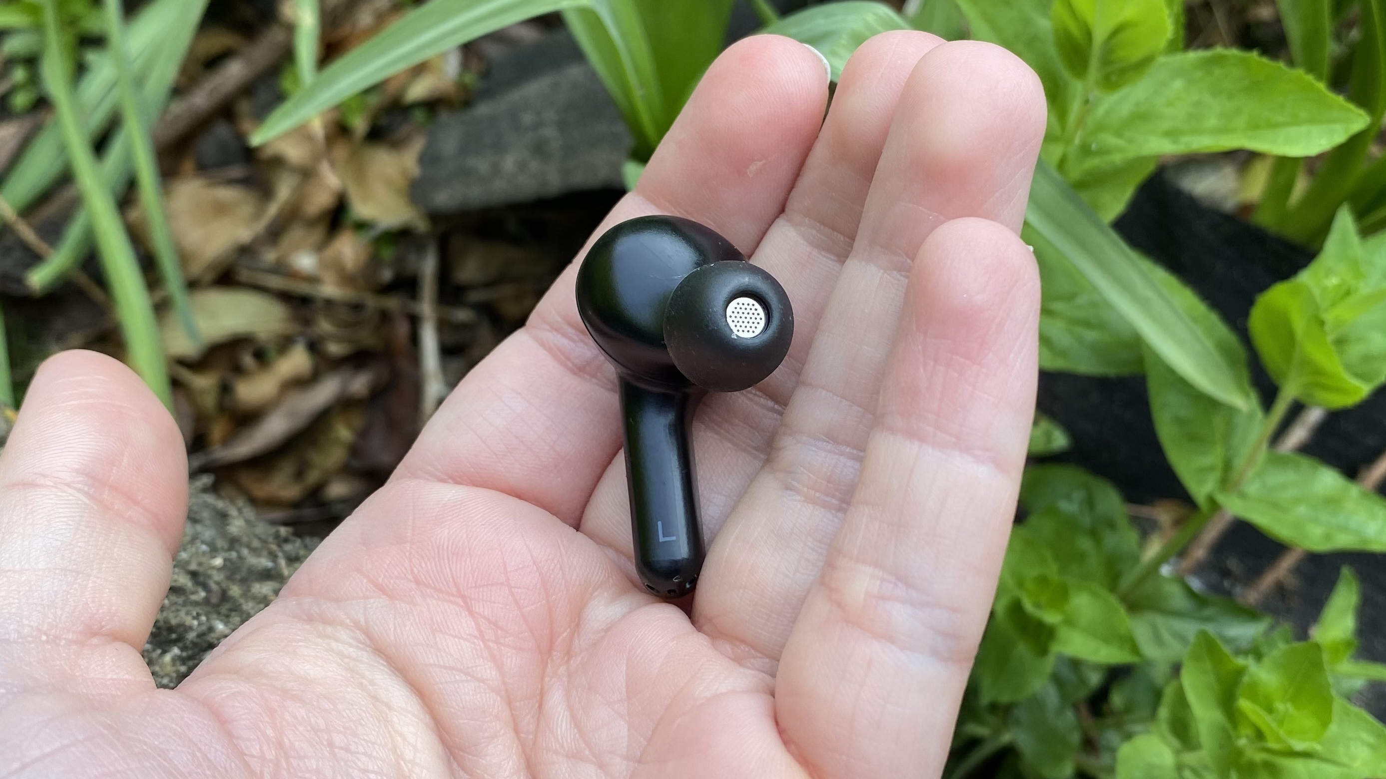 EarFun Air earbuds held in hand