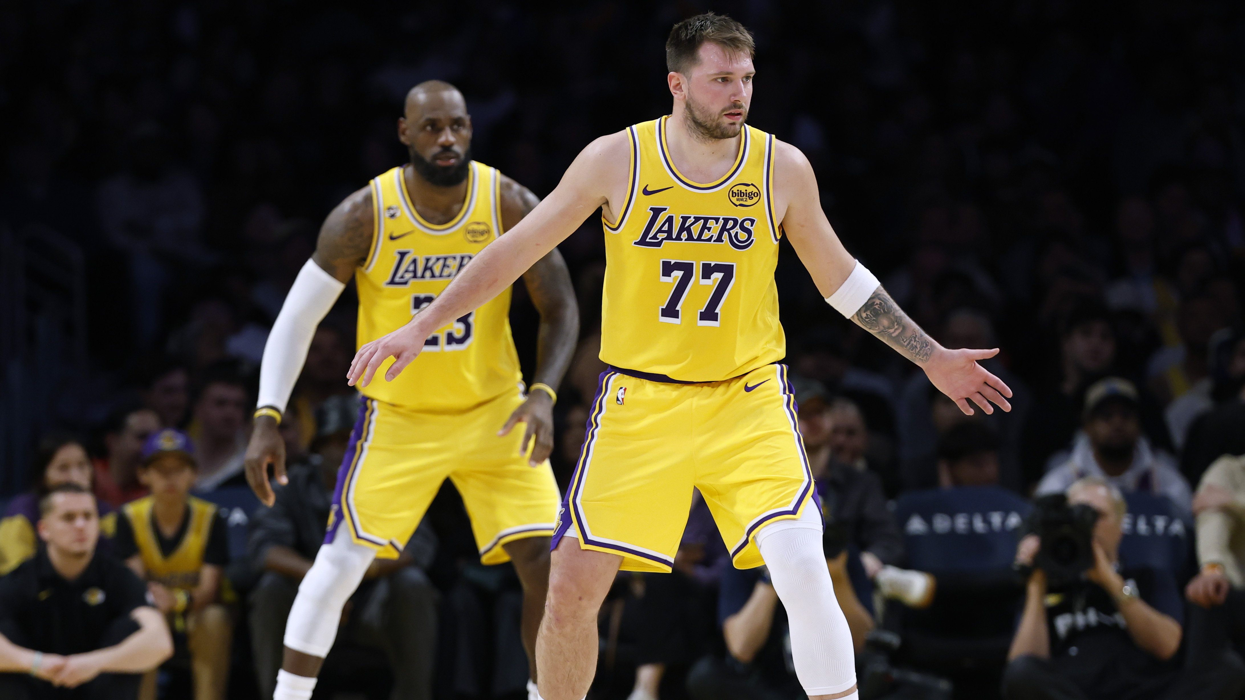 Luka Doncic #77 of the Los Angeles Lakers and LeBron James #23 of the Los Angeles Lakers