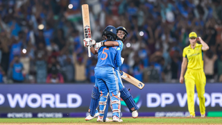 NAVI MUMBAI, INDIA - OCTOBER 30: Amanjot Kaur of India celebrates with Jemimah Rodrigues of India after winning the game during the ICC Women's Cricket World Cup India 2025 Semi-Final match between India and Australia at DY Patil Stadium on October 30, 2025 in Navi Mumbai, India.