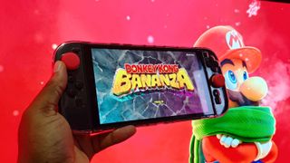 A man holding the Nintendo Switch 2