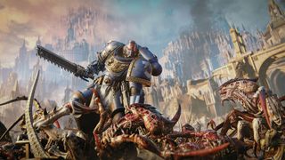 A Space Marine stands atop a pile of monster corpses
