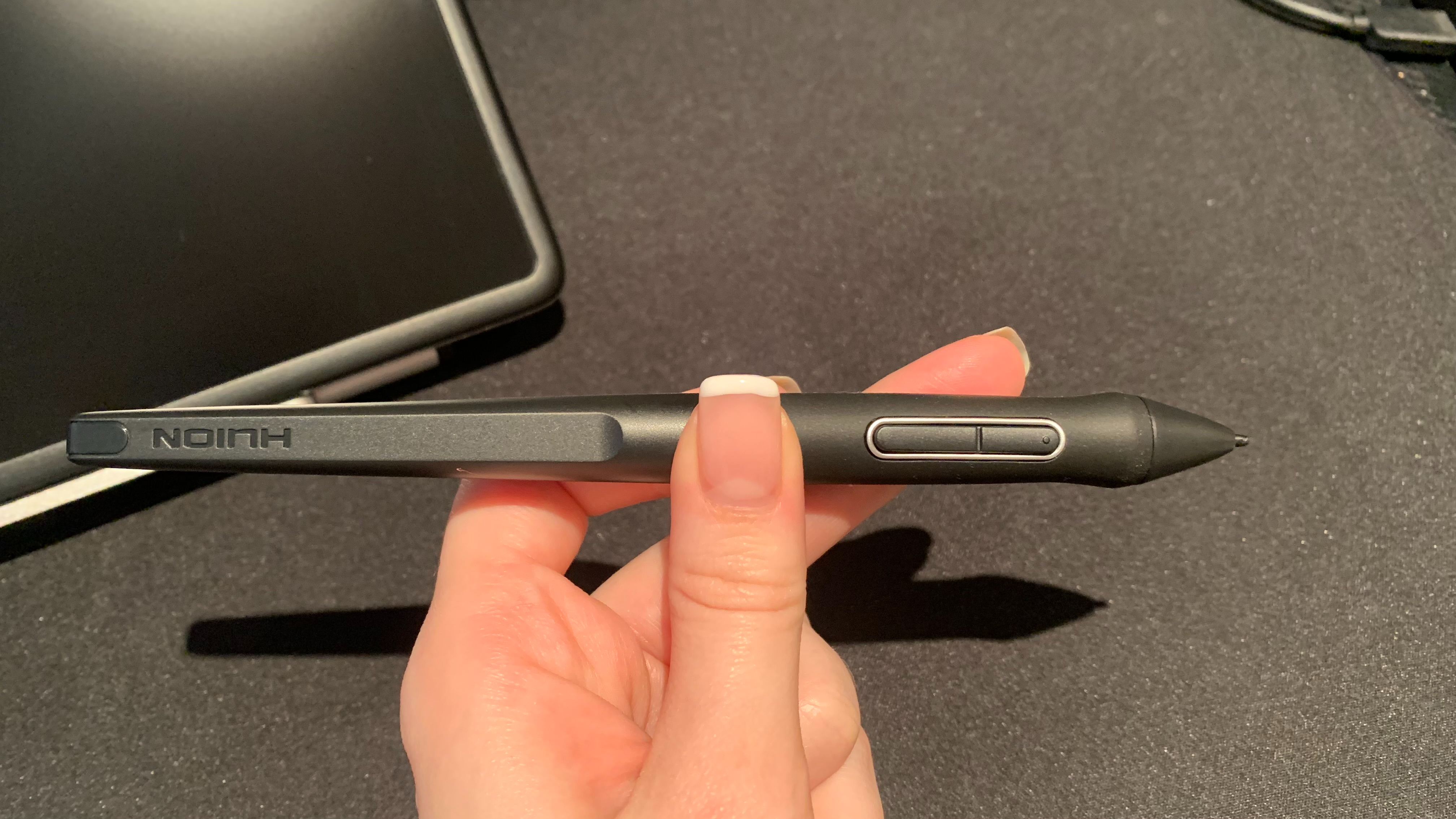 Huion Kamvas Pro 13 (2.5k) stylus in hand
