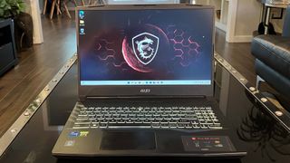 An MSI Pulse GL66 (2022) on a coffee table