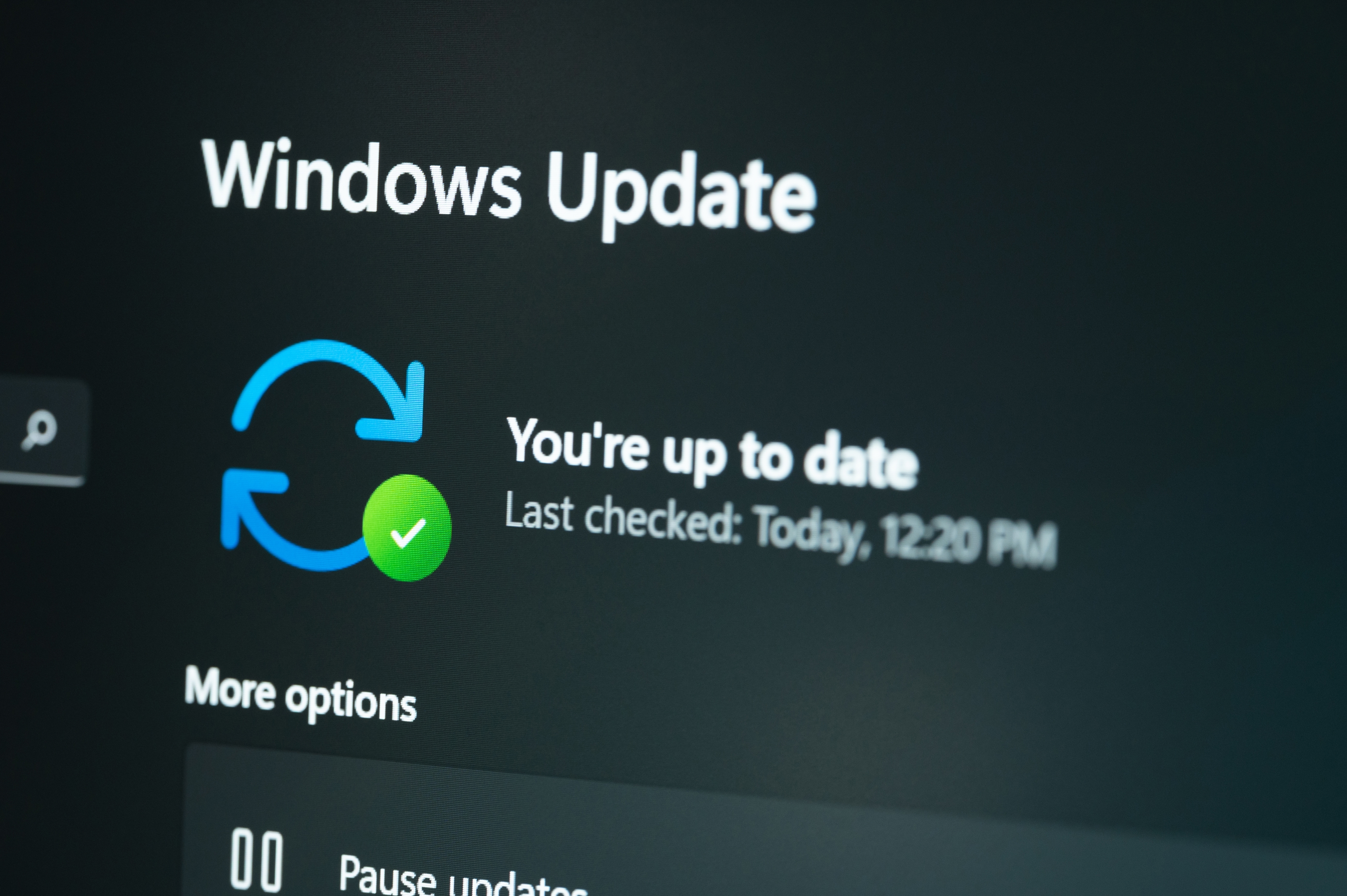 Checking windows update on laptop screen close up view