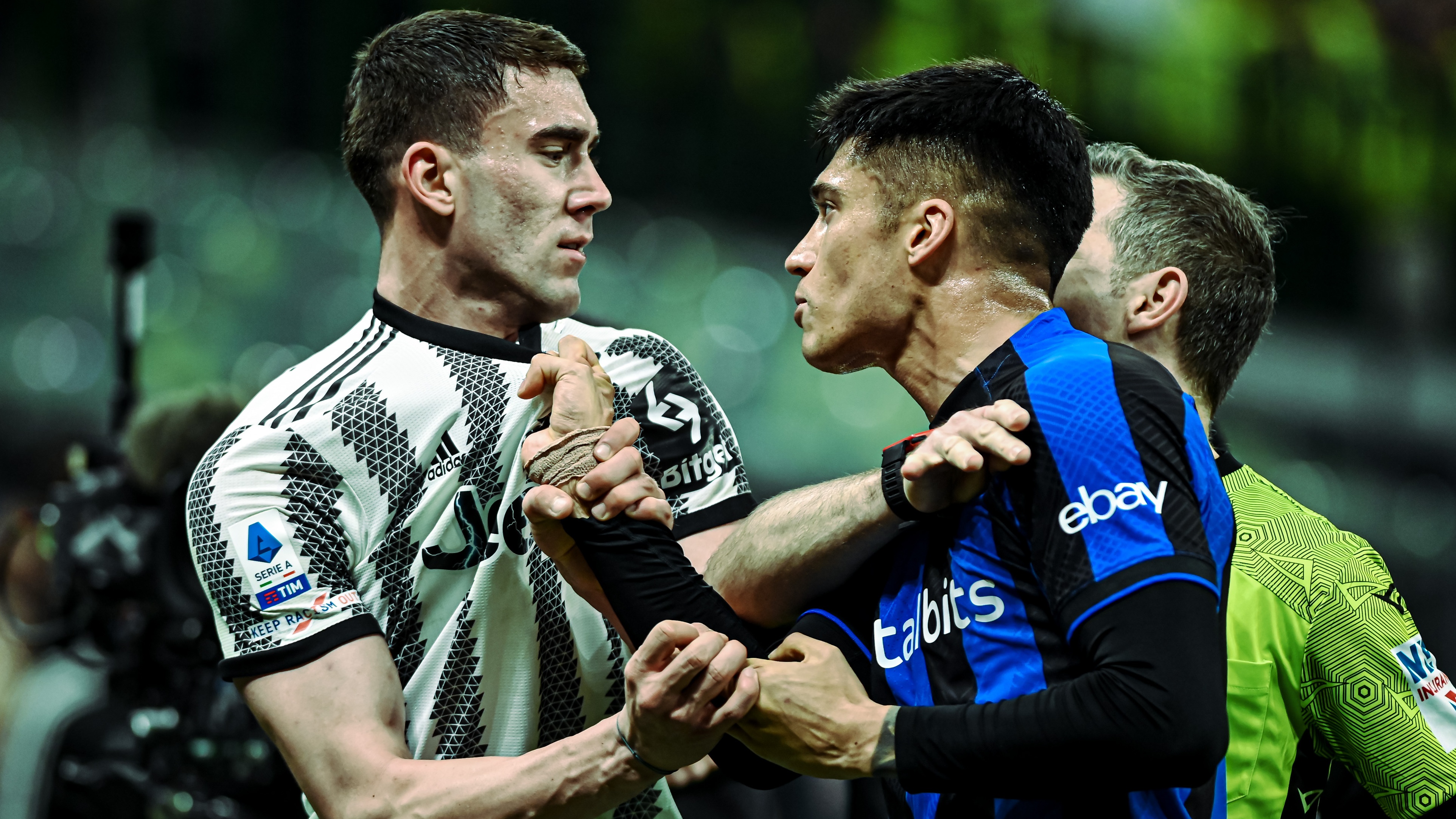 Dusan Vlahovic of Juventus scuffle with Joaquin Correa of FC Internazionale