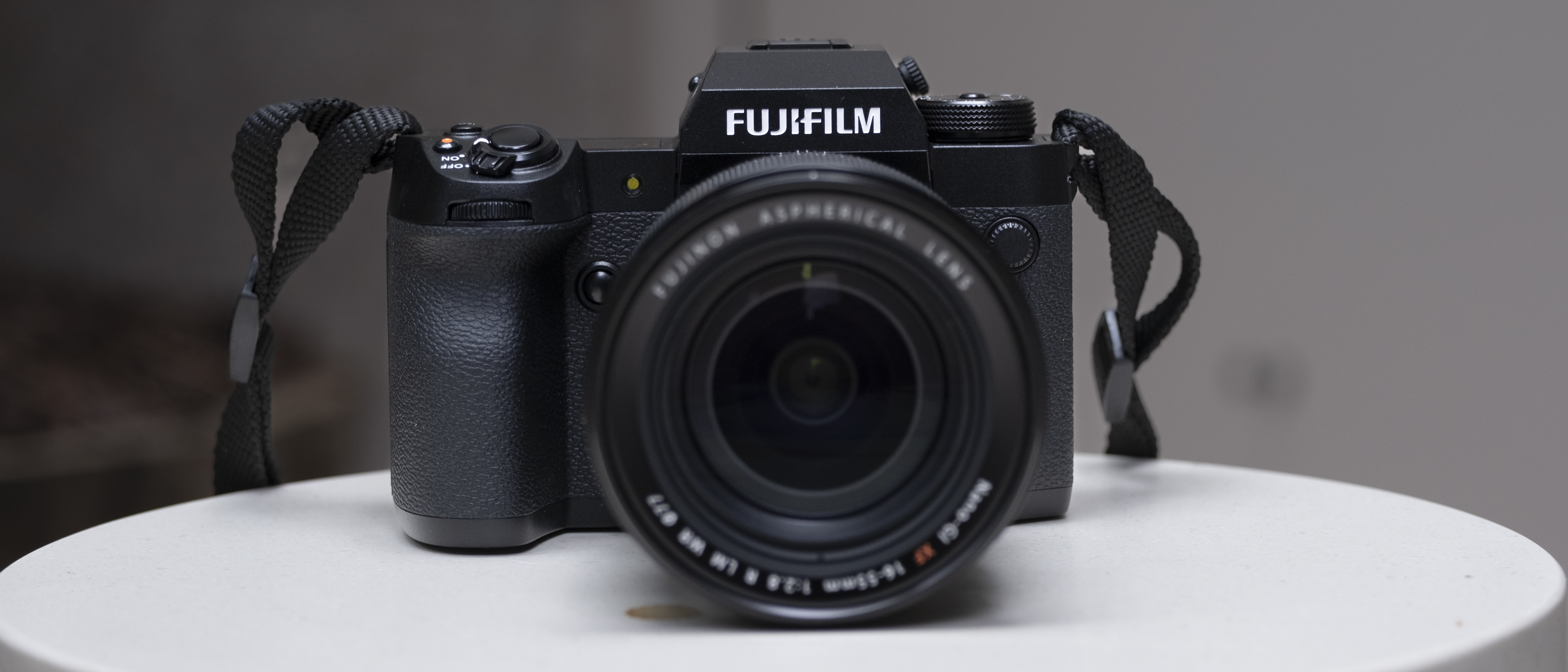 The Fujifilm X-H2 camera setting on a white table