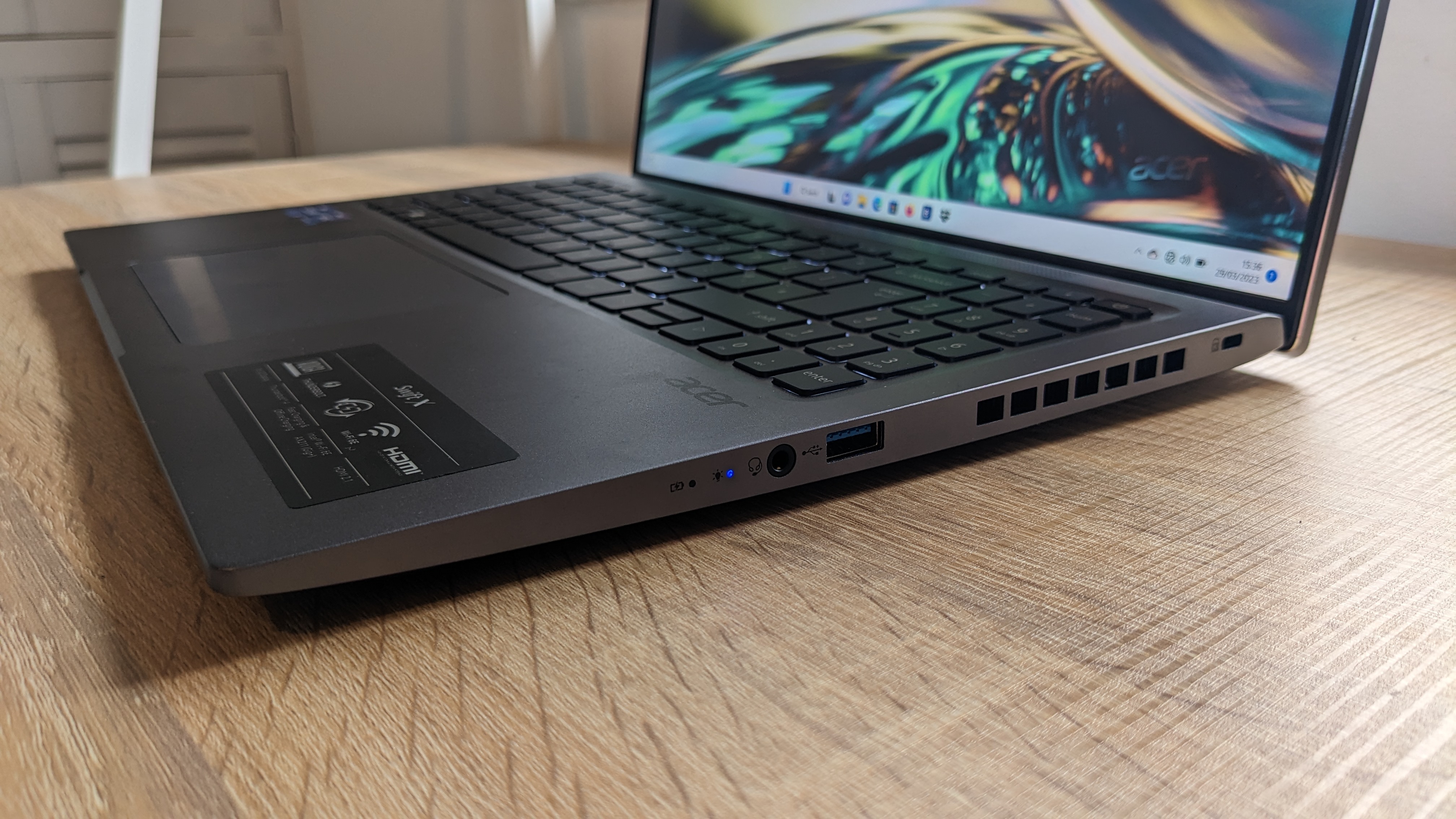 Acer Swift X 16 on wooden table