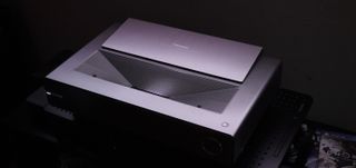 Hisense PX-1 Pro UST Projector against black background