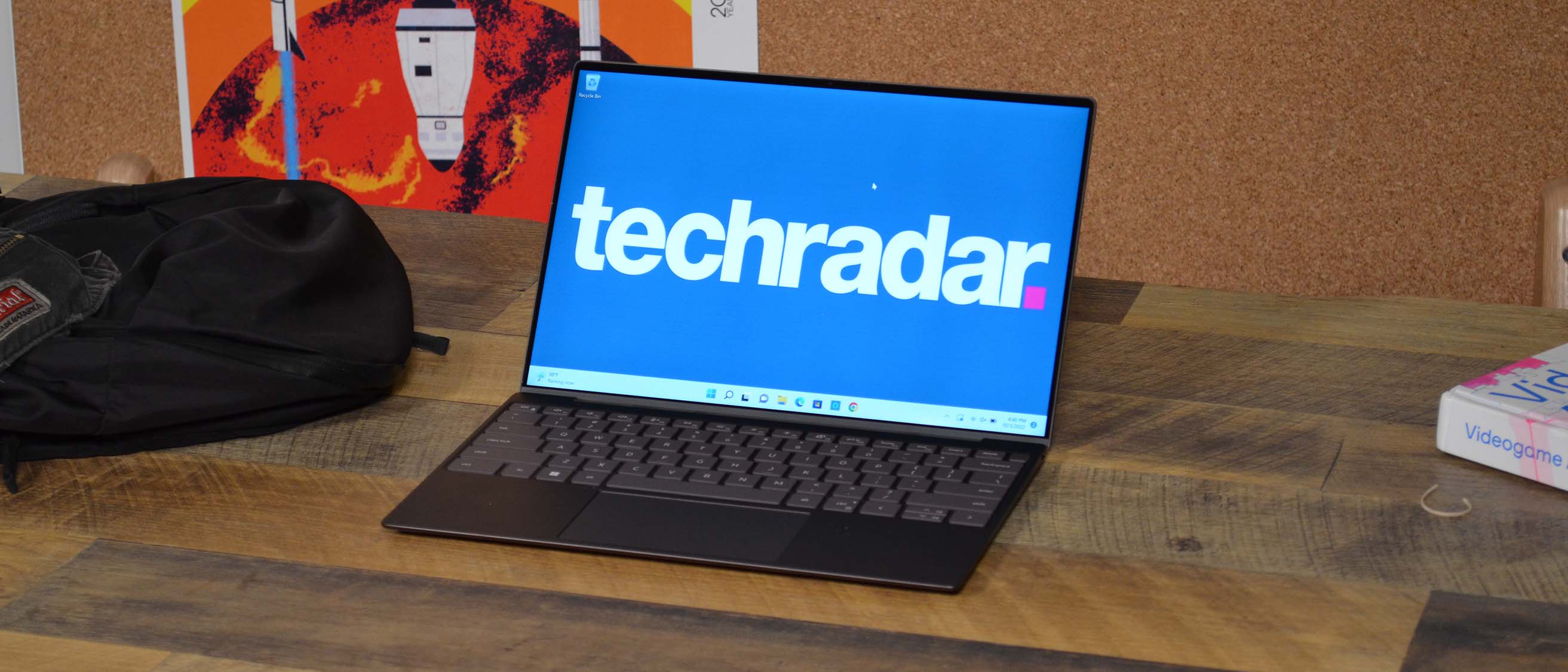 A Dell XPS 13 (2022) on a wooden table