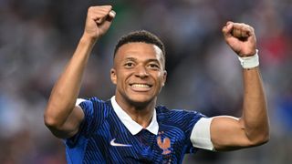 Kylian Mbappe of France celebrates scoring his team's second goal during the FIFA World Cup 2026 Group I match against Iraq at Philadelphia Stadium on June 22, 2026 in Philadelphia, Pennsylvania.