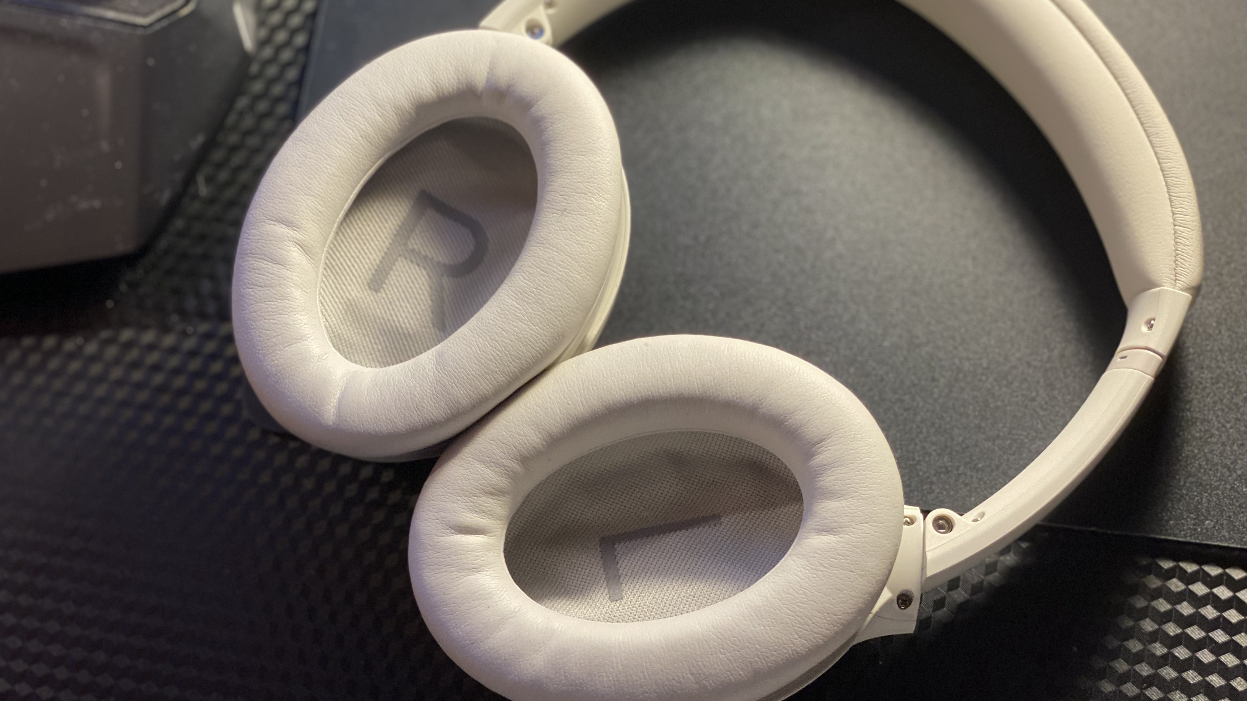The Bose QuietComfort 45 on a computer desk.