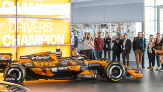 A photo of McLaren's 2026 season Formula 1 car taken at the McLaren Technology Centre in Surrey, England.