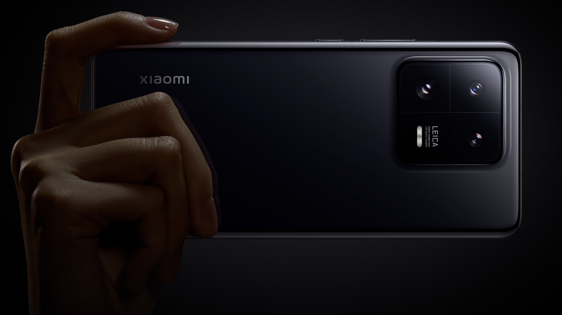 A Xiaomi 13 Pro from the back in someone's hand